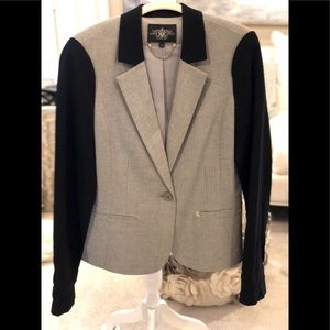 Never worn gray blazer with gold accents. Size 12 (fits more like a 10).